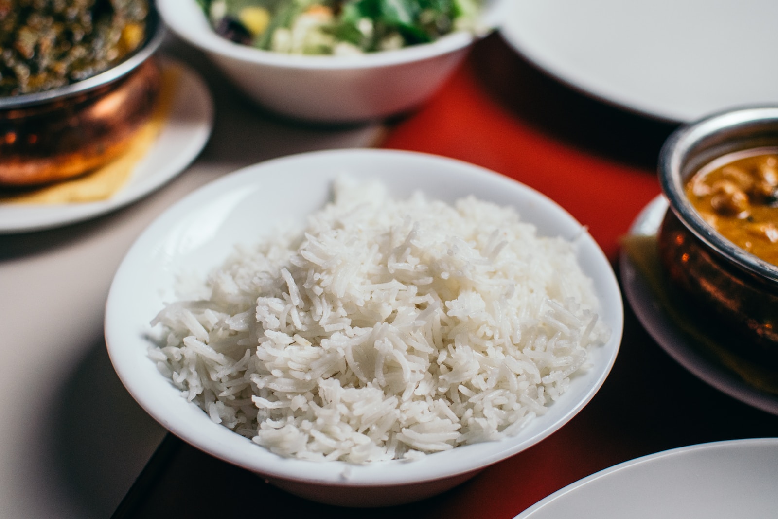 rice with sesame in black bowl