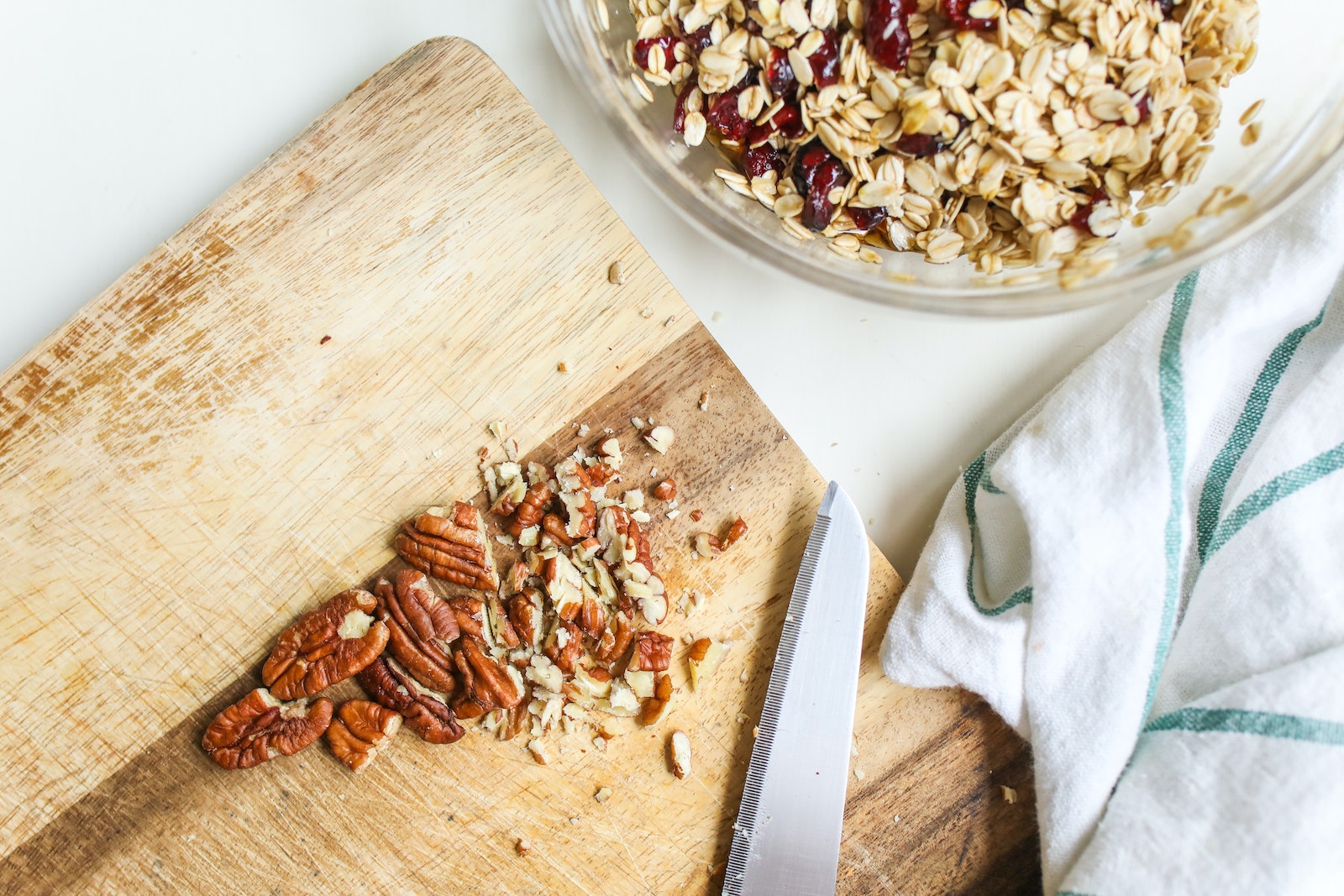 Photo Of Chopped nuts On Wooden Chopping Board