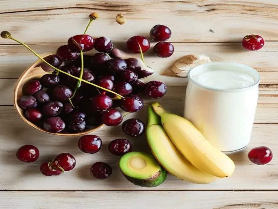 How to Make a Cherry Smoothie (Creamy, Easy & Absolutely Delicious) 5 Cherry smoothie ingredient substitutes laid out on wood surface showing different options for the recipe