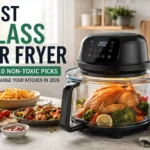 Best glass air fryer with visible golden crispy food inside transparent bowl on modern kitchen counter